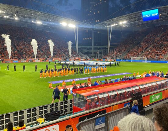 Pre-game show for the Women's Nations League, with players lining up for the national anthems.